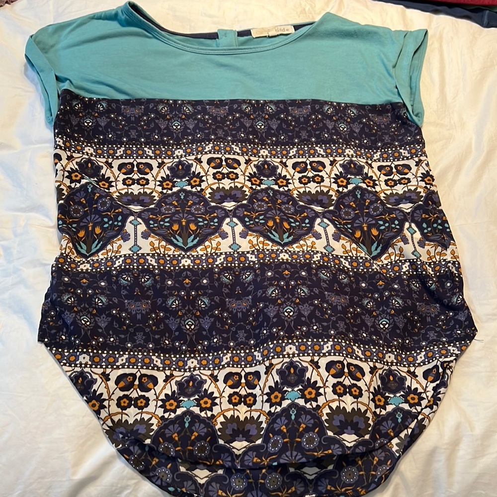Blue and white shirt. Size S.